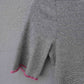 Ærme på sort hvid stribet t-shirt fra Jalfe med pink kant