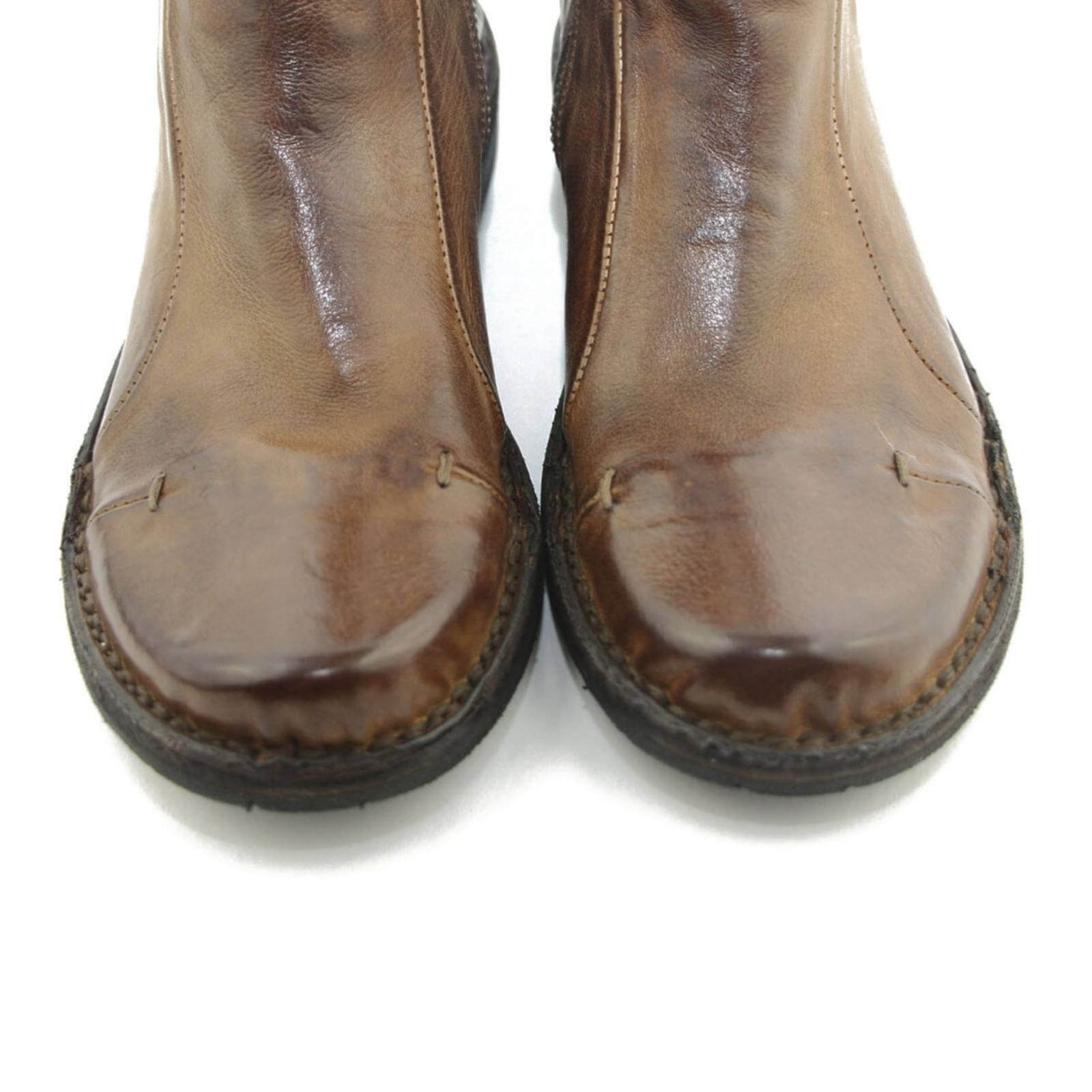 Snuderne af brune skind støvler fra Bubetti