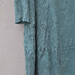 Silkestof detalje på petroleumsfarvet kjole fra Praechtig Berlin