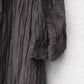 Ærme detalje på sort tunika i hør og silke